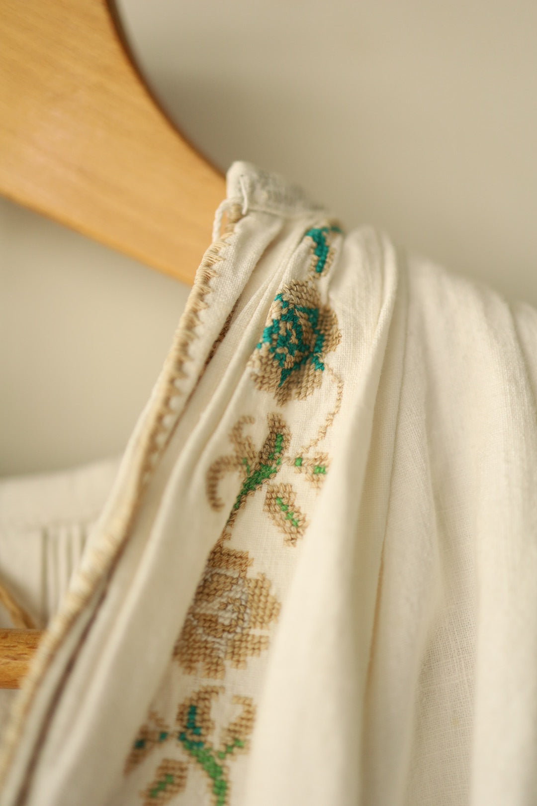 Shoulder seam with embroidery detail