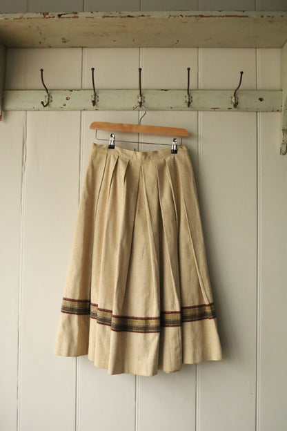 Heavy large pleated skirt with trim