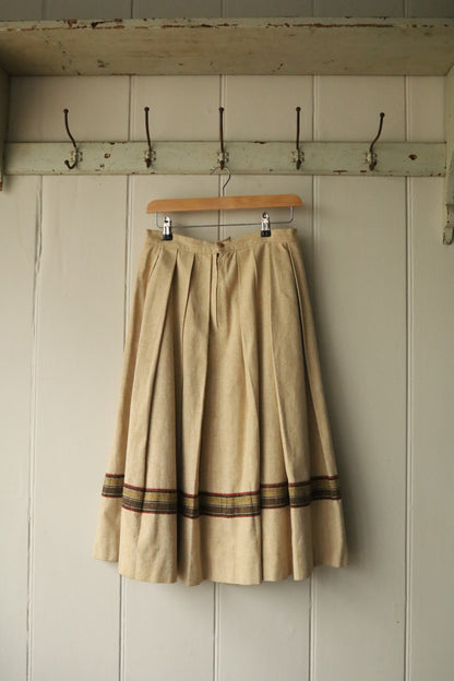 Heavy large pleated skirt with trim