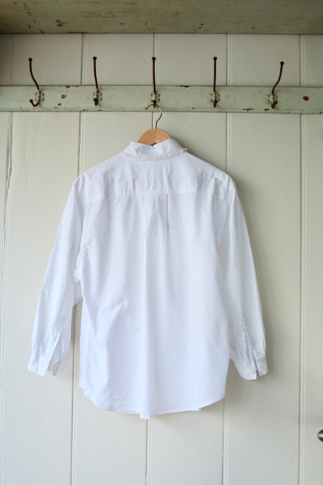 Lace trim pleated front shirt