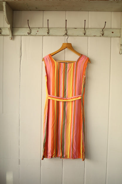 The reverse side of the same striped dress, showing a clean design with a horizontal waistband detail.