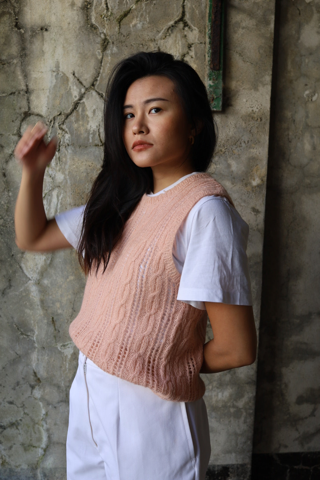 Hand-knitted pink cable tank