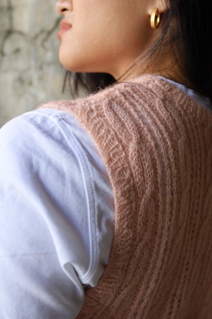 Hand-knitted pink cable tank