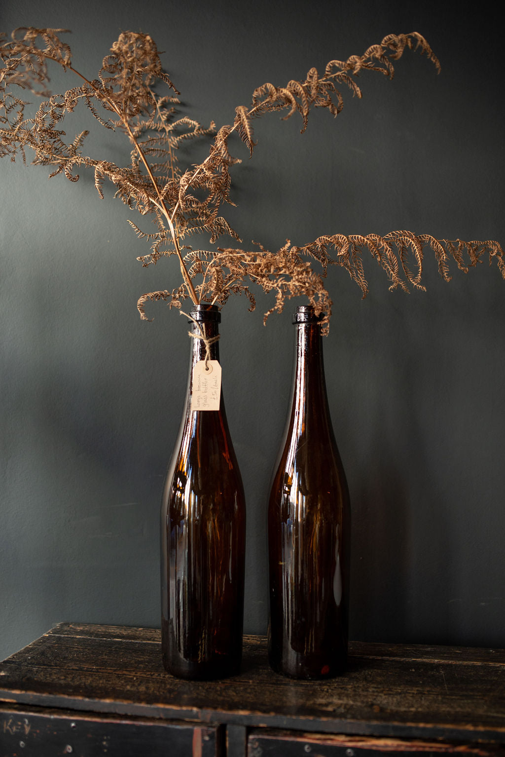 Pair of Extra Large Brown Glass Bottles