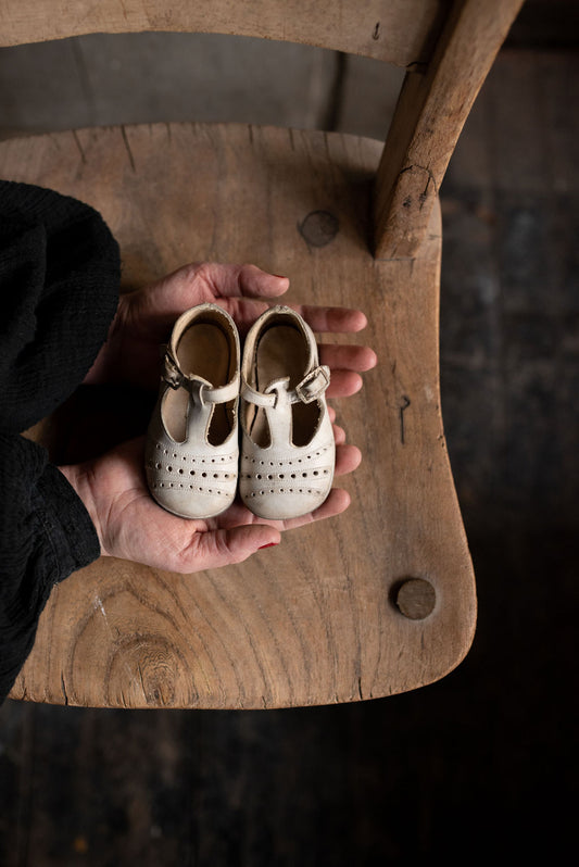 Pair of antique white child's shoes